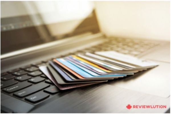 different credit cards on a laptop