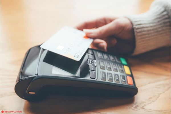 credit card tap on a payment terminal