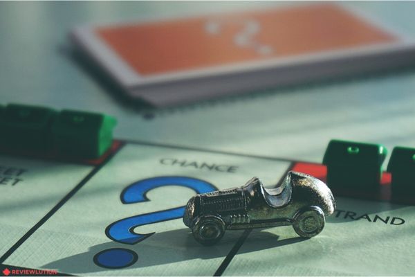Monopoly token on a board