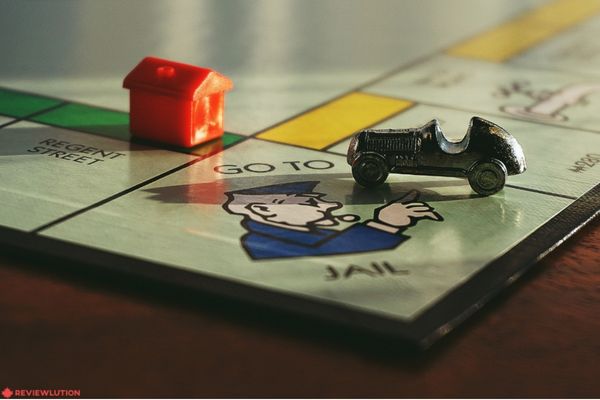 Monopoly tokens on a board