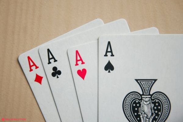 four aces on a table